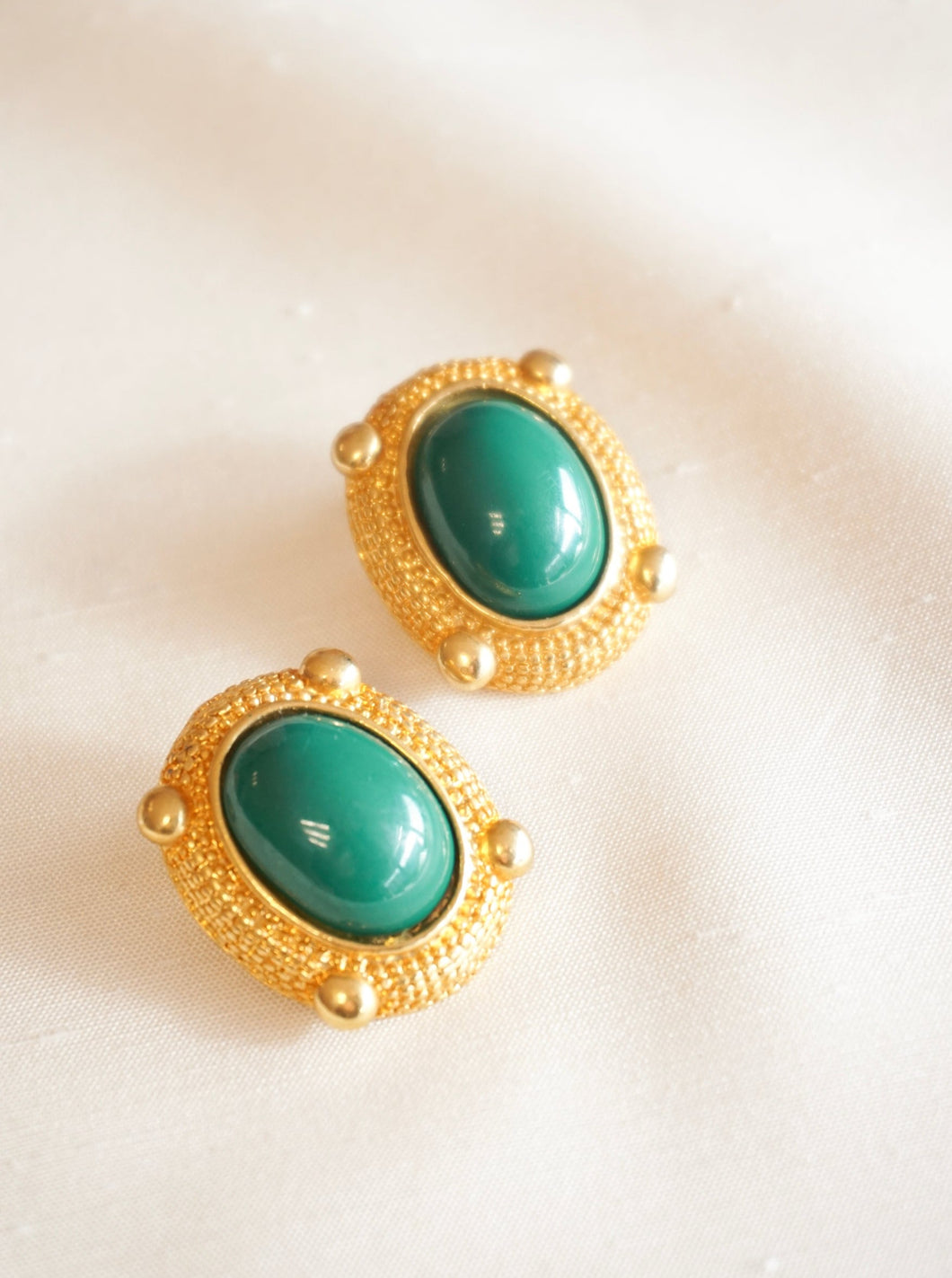 Green cabochon earrings with clips