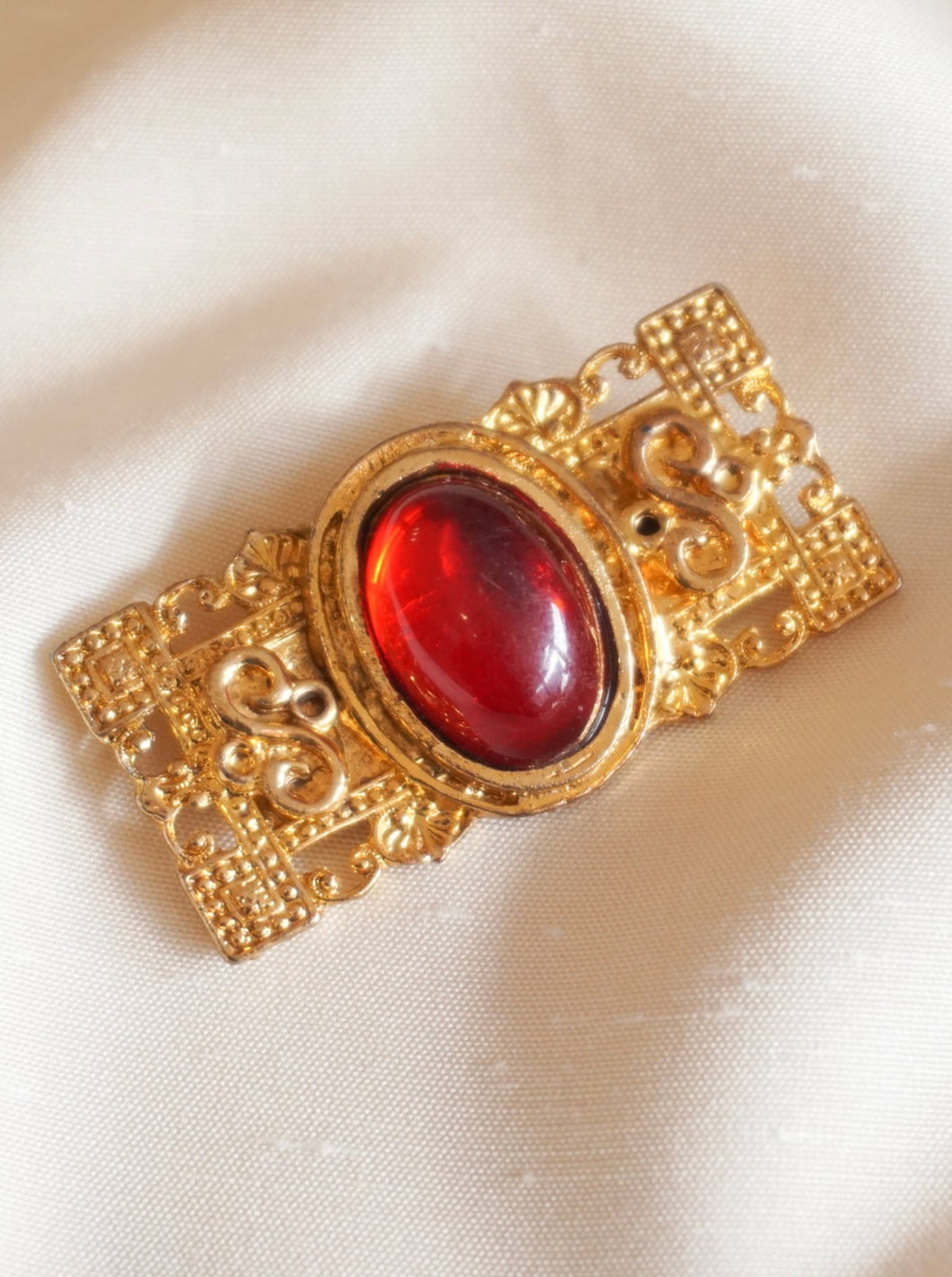 Vintage golden and red rectangle brooch
