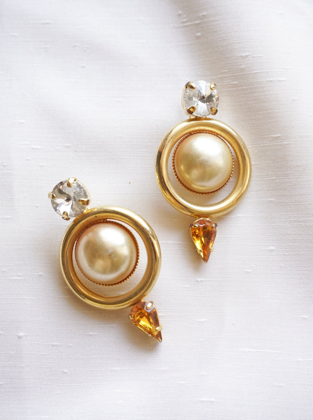 Baroque earrings with orange rhinestones