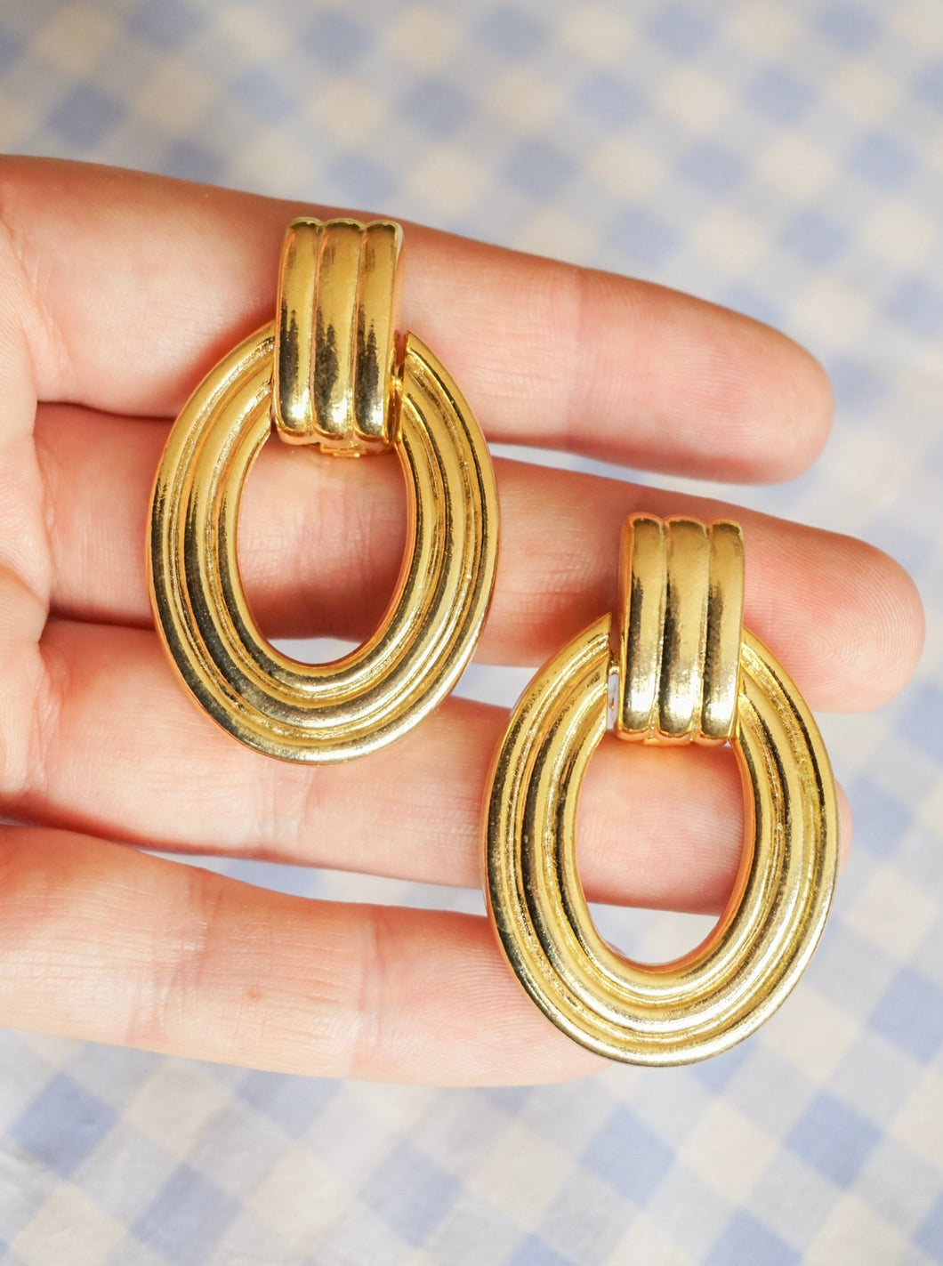 Golden clip-on earrings