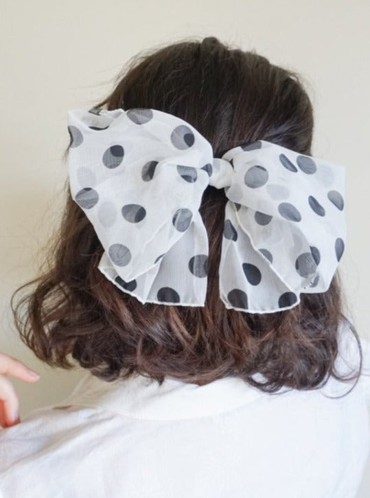 White vintage bow barrette with polka dots