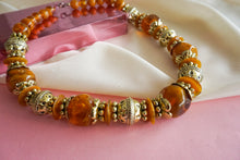 Load image into Gallery viewer, Amber and gold pearl necklace
