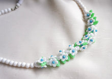 Load image into Gallery viewer, White and blue flower necklace
