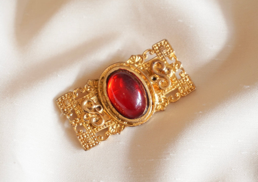 Vintage golden and red rectangle brooch