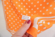 Load image into Gallery viewer, Orange silk scarf with white polka dots
