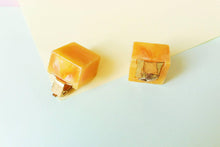 Load image into Gallery viewer, Vintage orange cube bakelite clips
