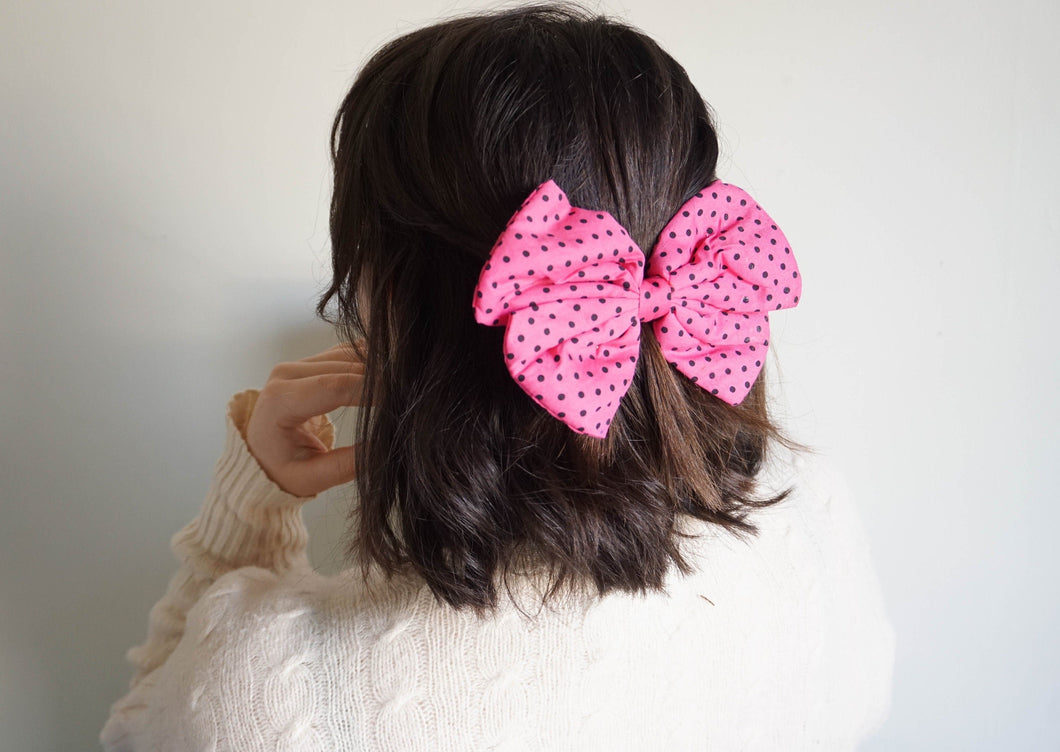 Pink bow barrette with vintage polka dots
